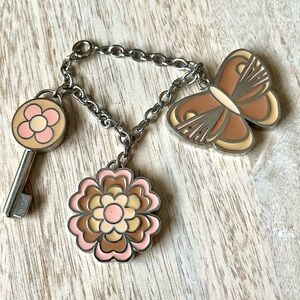 FOSSIL charms enamel logo key butterfly flower purse handbag accessory neutrals